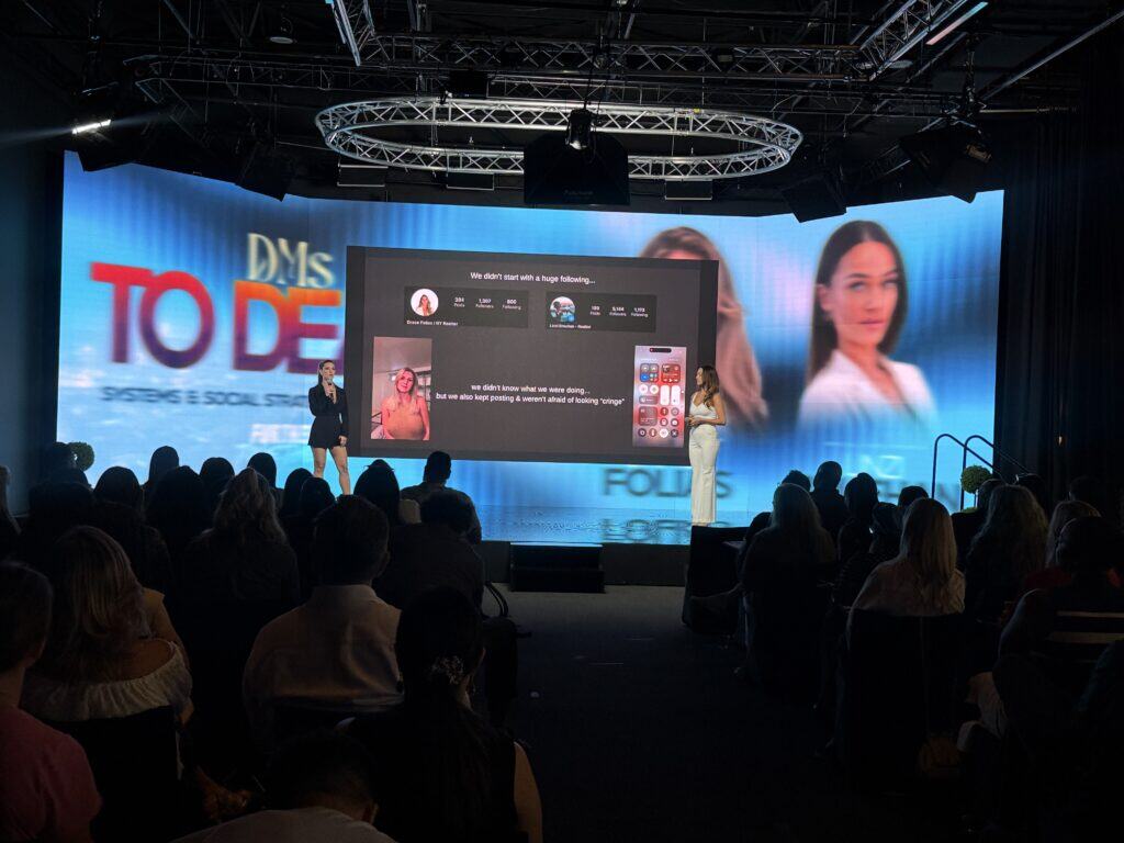 High-tech event stage featuring a large LED video wall, professional lighting, and audio setup at TriVision Studios, showcasing expert video production and live presentation services for corporate and creative projects.