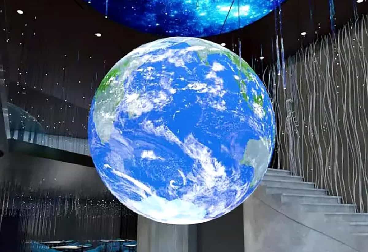 Earth globe display at TriVision Studios featuring immersive digital environmental visuals and innovative projection technology.