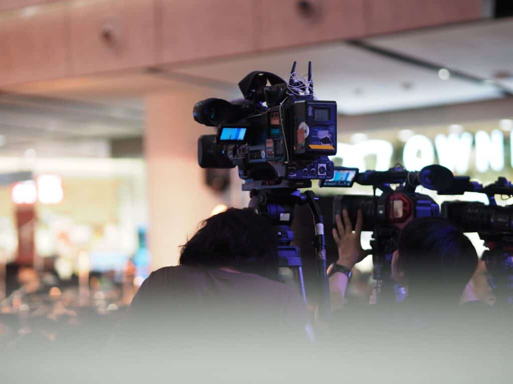 High-quality broadcast cameras capturing live event footage for professional video production and broadcasting services.